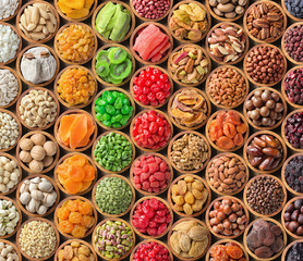 collection of dried fruit and nuts background, healthy snacks for vegan.