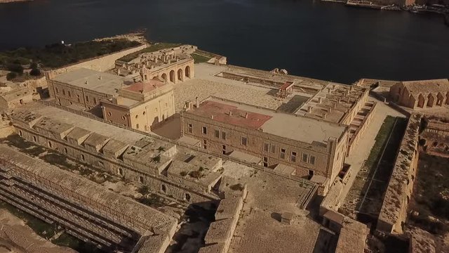 Aerial view fo Fort Manoel, Malta. Made famous by Game of Thrones and Assassin's Creed. Flyover without city backdrop.