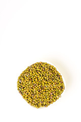 Green gram seed or mung beans in bowl on white background 