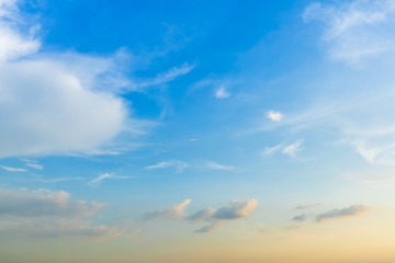 Obraz premium blue bright and orange yellow dramatic sunset sky in countryside texture background.