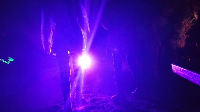 Silhouette on Colorful Party Lights