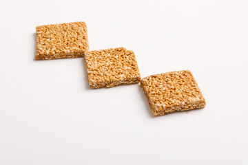 Indian sweet dish,Sesame seeds ball or called in hindi, til ke laddu on white background 