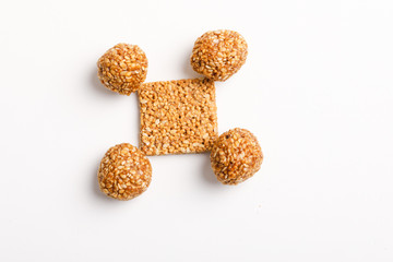 Indian sweet dish,Sesame seeds ball or called in hindi, til ke laddu on white background 