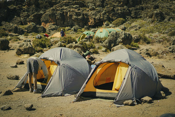 Camping spot on the mountain on the way up Kilimanjaro Mountain in Tanzania blue sky