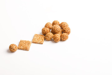Indian sweet dish,Sesame seeds ball or called in hindi, til ke laddu on white background 