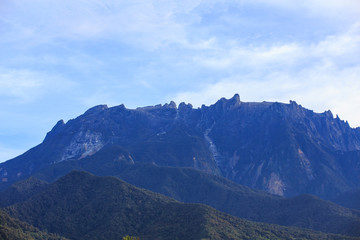 Fototapeta na wymiar Amazing beautiful scenery view of the greatest Mount Kinabalu Sabah, Borneo Island with local village house view from Kundasang Town, Sabah, Borneo