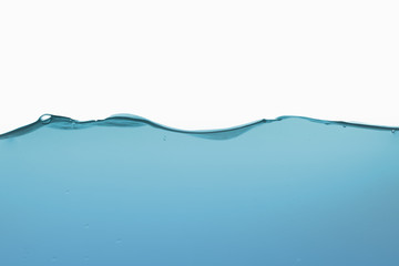 Water splash or water wave with bubbles of air on the background.
