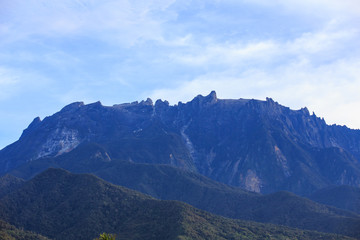 Fototapeta na wymiar Amazing beautiful scenery view of the greatest Mount Kinabalu Sabah, Borneo Island with local village house view from Kundasang Town, Sabah, Borneo