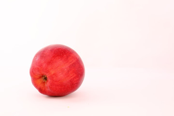 A lovely red apple waiting to be eaten