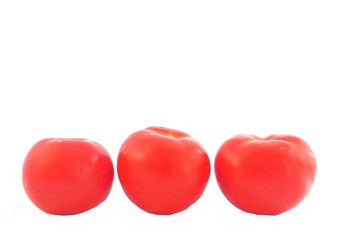 Three lovely ripe tomatoes on the market