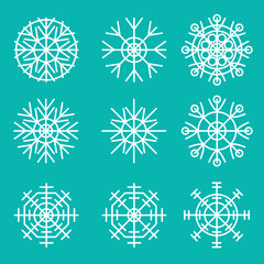 Set of snowflakes. Vector illustration on the blue background.