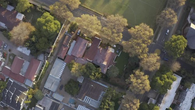 Zooming in on city suburb  - drone shot