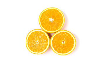 Three orange halves on a white isolated background.