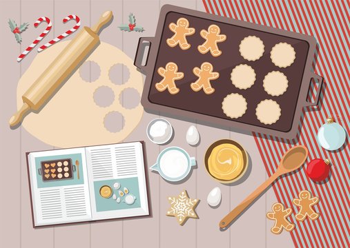 Bakery background with ingredients for cooking christmas baking. Sugar, eggs and spices on kitchen table,top view.