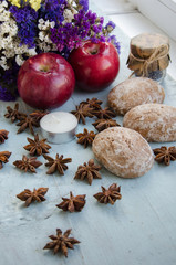 Colorful autumn decorations flowers apples anise candles