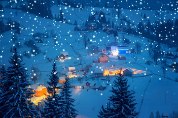 fir trees covered with snow and mountains on horizon. beautiful winter landscape