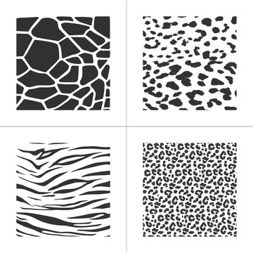 Wildlife animal skin texture print of tiger, leopard, giraffe and zebra. Vector illustration isolated on white background.