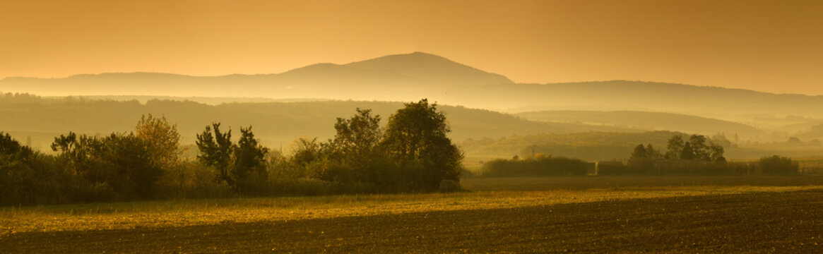 Beautiful foggy landscape in panorma view in the morning hours
