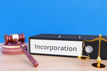 Incorporation – Folder with labeling, gavel and libra – law, judgement, lawyer