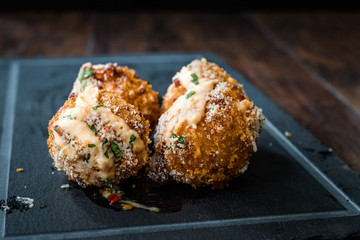 Fried Mac and Cheese Balls with Parmesan Cheese and Mayonnaise / Macaroni Bites.