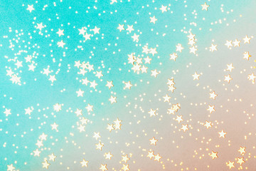 Trendy coral and blue background with golden stars. The concept of celebrations, the Day of St....