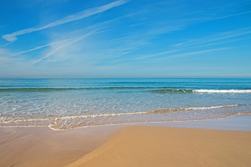 Fototapeta na wymiar Scenica shot of calm turquoise sea and beach.