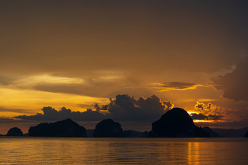 Naklejka na ściany i meble Tubkaak Beach, Krabi Province, Thailand, views of islands, sea and mountains in the evening The sky and clouds are very beautiful.