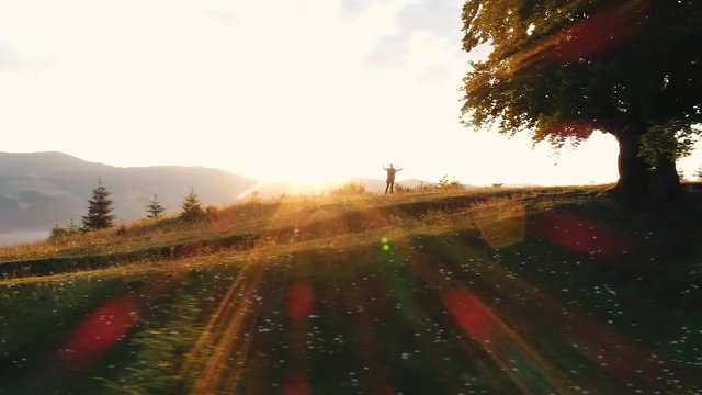 the guy moves among nature and mountains aerial view