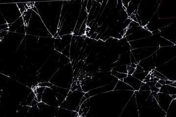 cracked glass isolated on a black background.