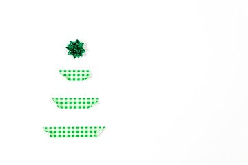 Christmas tree made of scotch and star decoration. Holiday concept. Alternative Christmas tree. Flat lay. Isolated on white background. Copy space.