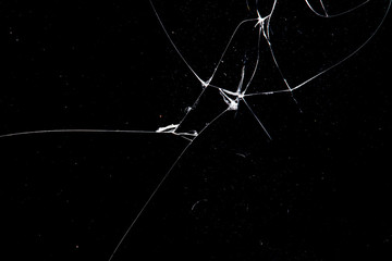 cracked glass isolated on a black background.