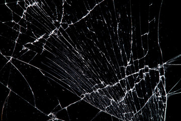 cracked glass isolated on a black background.