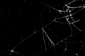 cracked glass isolated on a black background.