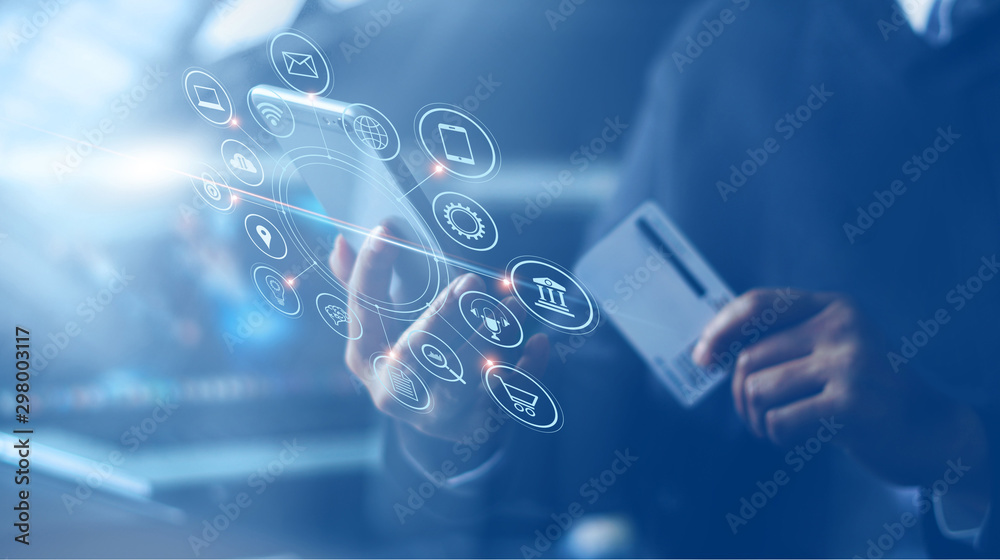 Poster businessman with mobile smartphone and credit card in hand paying online and shopping on virtual int
