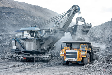 Open mountain quarry. Loading coal into a mining truck. © nordroden