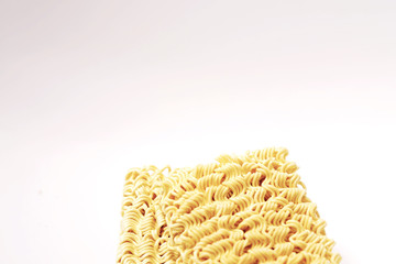 Two stacked dry instant noodle isolated in white background