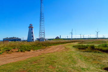 Fototapeta na wymiar North Point Lighthouse, and wind turbines, PEI