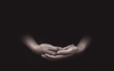 Praying hands concentrating attentively and meditation on beliefs or hope background. Gestures of...