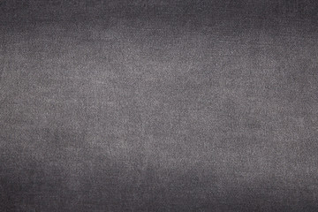Fototapeta premium Black jeans fabric. Denim jeans texture or denim jeans background. Denim jeans for fashion design