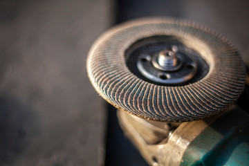 Disc for grinding metal. Work tool for processing metal structures. Grinder for metal cutting. Tool close-up.
