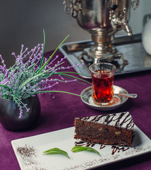 brownie with black tea on the table