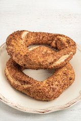 crispy Turkish bagel, simit on a wooden table