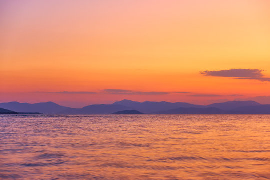 Sunset over the sea and islands