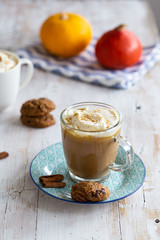 Two cups with pumpkin spice latte