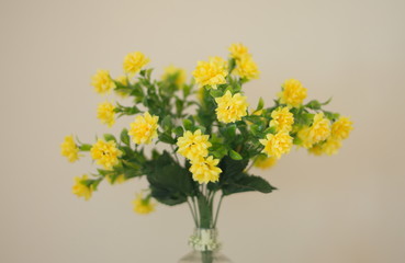 Yellow decorative flower group for indoor decoration.