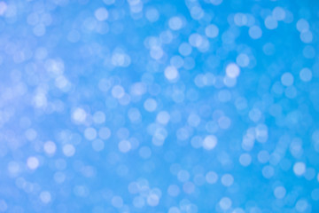 Blue bokeh on circle abstract light background.Blurred abstract pink background.