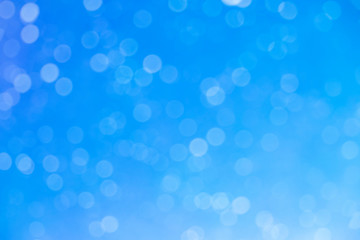 Blue bokeh on circle abstract light background.Blurred abstract pink background.