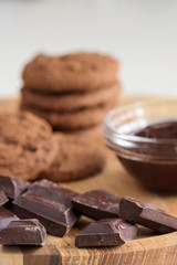 Brown biscuits with dark chocolate composition