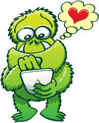 Ugly green monster using a tactile tablet to look for a romantic date online . He keeps smiling while browsing the Internet with his finger. He shows a red heart inside a yellow thought bubble
