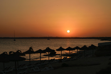 Sunset at playa migjorn, Formentera, in the distance Cap de Barbaria
